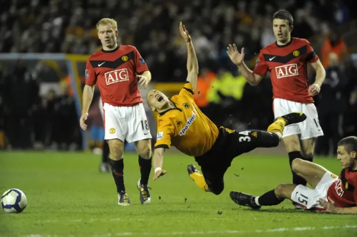 Framed Print : Intense Barclays Premier League Clash: Guedioura Fouls Vidic (Wolverhampton Wanderers vs Manchester United, 2010) Framed Print : Intense Barclays Premier League Clash: Guedioura Fouls Vidic (Wolverhampton Wanderers vs Manchester United, 2010)