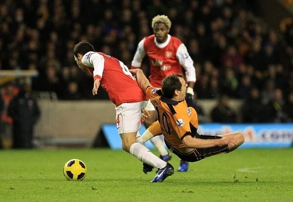 Intense Barclays Premier League Clash: Cesc Fabregas Fouls Nenad Milijas (Wolverhampton Wanderers vs. Arsenal)