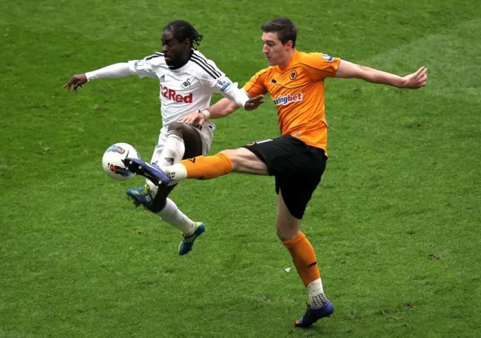 Framed Print : Intense Battle: Nathan Dyer vs. Stephen Ward - Wolverhampton Wanderers vs. Swansea City, Barclays Premier League Framed Print : Intense Battle: Nathan Dyer vs. Stephen Ward - Wolverhampton Wanderers vs. Swansea City, Barclays Premier League
