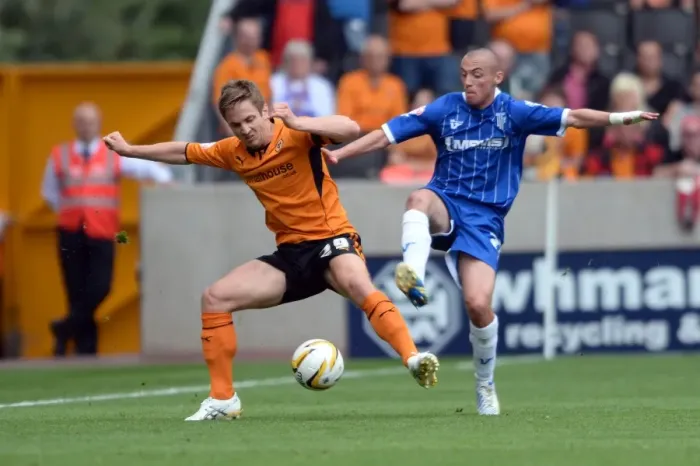 Framed Print : Intense Battle for Possession: Wolverhampton Wanderers vs. Gillingham Framed Print : Intense Battle for Possession: Wolverhampton Wanderers vs. Gillingham