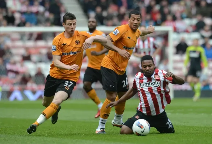 Framed Print : Intense Clash: Sessegnon vs. Davis at Stadium of Light - Wolverhampton Wanderers vs. Sunderland, Premier League