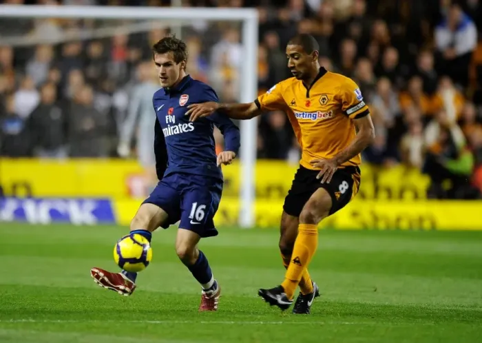 Framed Print : Intense Rivalry: Aaron Ramsey vs. Karl Henry Clash in Wolverhampton Wanderers vs. Arsenal Premier League Soccer Match Framed Print : Intense Rivalry: Aaron Ramsey vs. Karl Henry Clash in Wolverhampton Wanderers vs. Arsenal Premier League Soccer Match