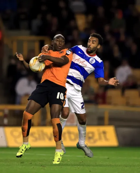 Framed Print : Intense Rivalry: Afobe vs. Perch Battle in Wolves vs. QPR Championship Clash at Molineux Framed Print : Intense Rivalry: Afobe vs. Perch Battle in Wolves vs. QPR Championship Clash at Molineux