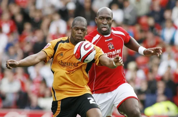 Framed Print : Intense Rivalry: Harewood vs Moore Clash at Barnsley vs Wolverhampton Wanderers Championship Match, 2009