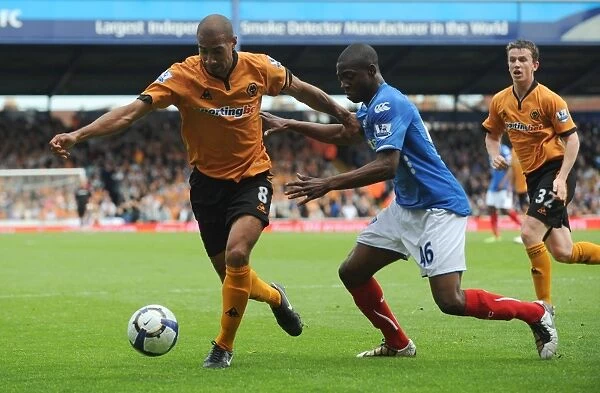 Intense Rivalry: Henry vs. Sowah Clash in Portsmouth vs. Wolverhampton Premier League Showdown