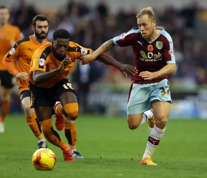 Framed Print : Intense Rivalry: Iorfa vs Arfield - Wolves vs Burnley's Championship Battle Framed Print : Intense Rivalry: Iorfa vs Arfield - Wolves vs Burnley's Championship Battle