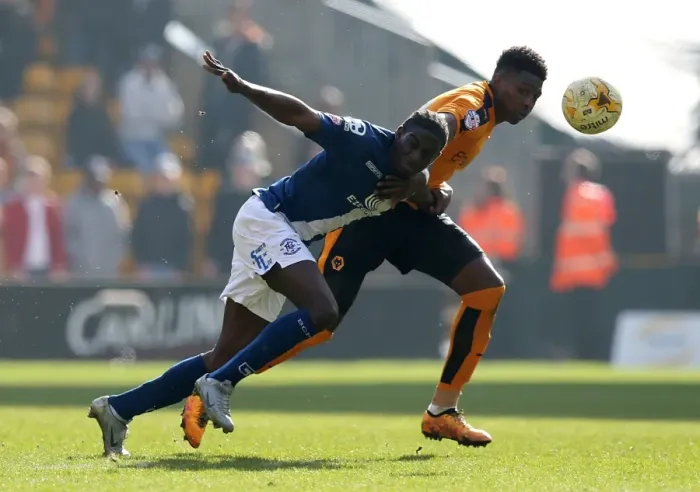 Framed Print : Intense Rivalry: Maghoma vs. Hause in Wolves vs. Birmingham City Championship Clash Framed Print : Intense Rivalry: Maghoma vs. Hause in Wolves vs. Birmingham City Championship Clash
