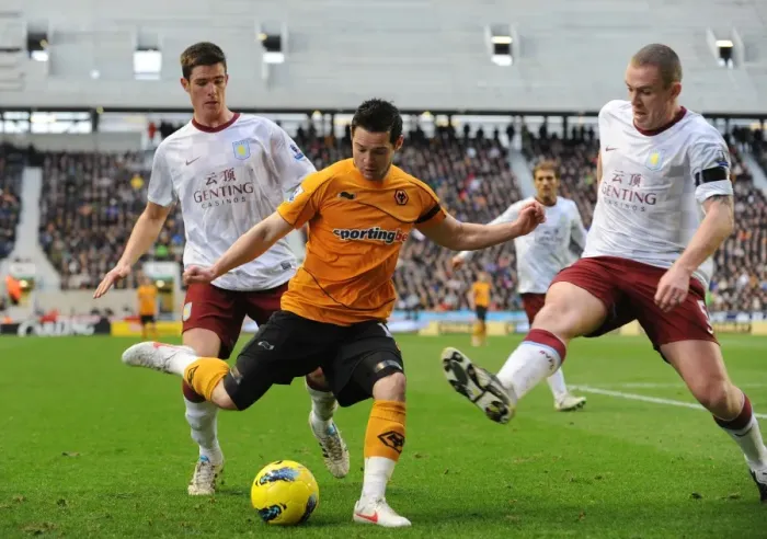 Framed Print : Intense Rivalry: Matt Jarvis vs. Aston Villa Defenders Ciaran Clark and Richard Dunne - A Wolverhampton Wanderers vs. Aston Villa Moment