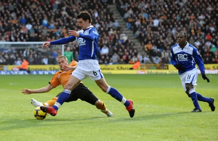 Framed Print : Intense Rivalry: Michael Kightly's Slide Tackle on Liam Ridgewell (Wolverhampton Wanderers vs Birmingham City, Premier League) Framed Print : Intense Rivalry: Michael Kightly's Slide Tackle on Liam Ridgewell (Wolverhampton Wanderers vs Birmingham City, Premier League)