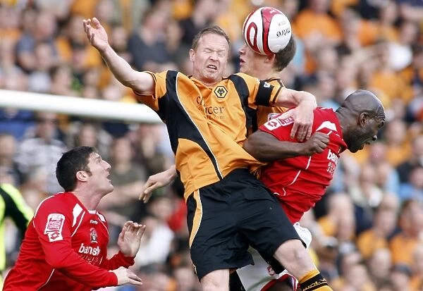 Intense Rivalry: Moore, Craddock, and Berra's Clash between Barnsley and Wolverhampton Wanderers in the 2009 Championship Battle