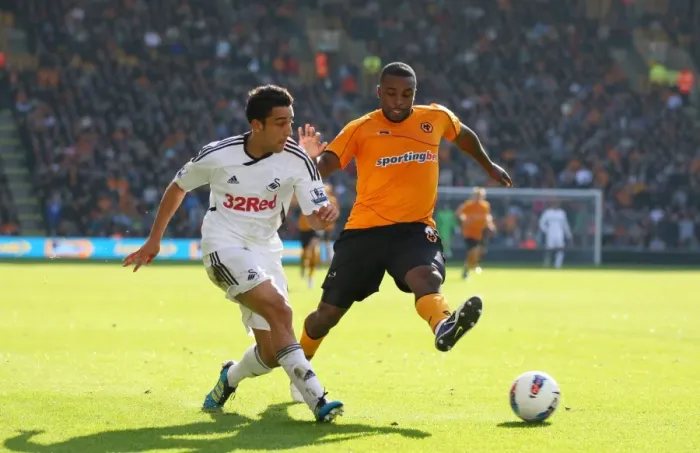Framed Print : Intense Rivalry: Neil Taylor vs. Sylvan Ebanks-Blake - A Moment of Passion in Wolverhampton Wanderers vs. Swansea City Football Match Framed Print : Intense Rivalry: Neil Taylor vs. Sylvan Ebanks-Blake - A Moment of Passion in Wolverhampton Wanderers vs. Swansea City Football Match