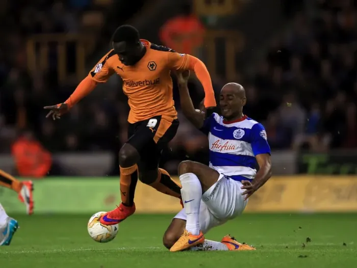 Framed Print : Intense Rivalry: Nouha Dicko vs. Karl Henry Battle at Molineux Stadium (Sky Bet Championship)