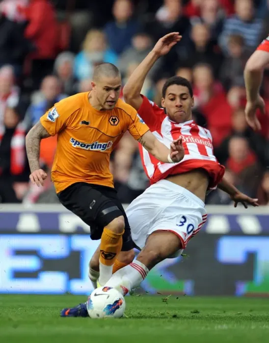 Framed Print : Intense Rivalry: Shotton vs. Kightly - The Unforgettable Tackle in Wolverhampton Wanderers vs. Stoke City Premier League Clash Framed Print : Intense Rivalry: Shotton vs. Kightly - The Unforgettable Tackle in Wolverhampton Wanderers vs. Stoke City Premier League Clash