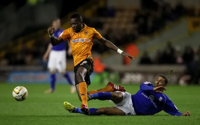 Framed Print : Intense Rivalry: Tongo Doumbia vs. Hayden Mullins - Wolves vs. Birmingham City (2012) - Npower Championship Clash