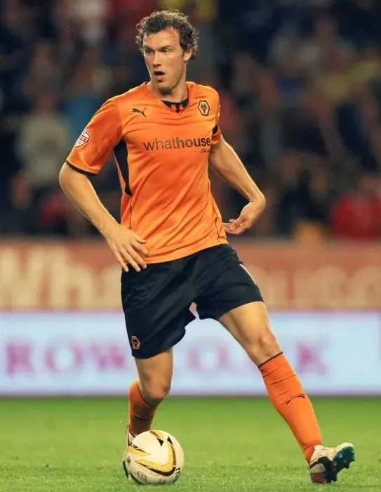 Framed Print : Kevin McDonald's Determined Performance: Wolves Overpower Walsall in Johnstones Paint Trophy (September 3, 2013)