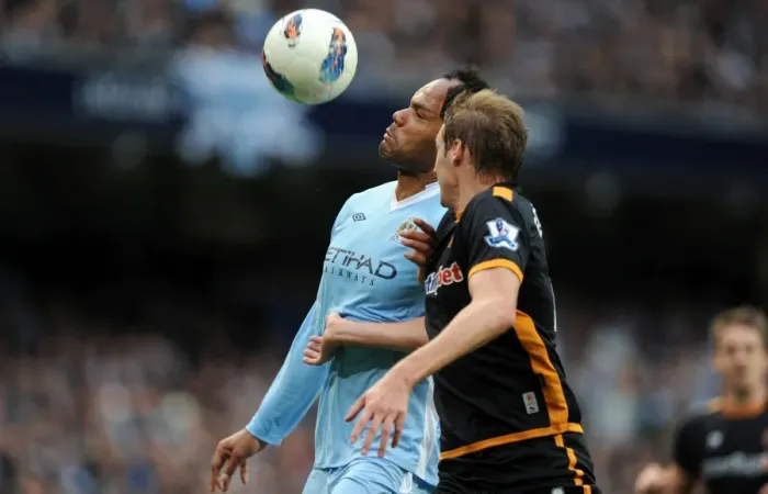 Framed Print : Lescott vs. Edwards: A Premier League Showdown - Manchester City vs. Wolverhampton Wanderers Framed Print : Lescott vs. Edwards: A Premier League Showdown - Manchester City vs. Wolverhampton Wanderers