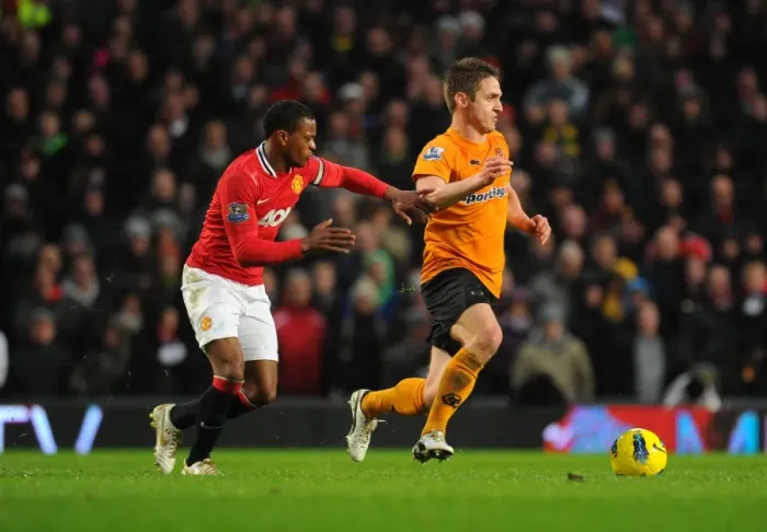 Framed Print : Manchester United vs. Wolverhampton Wanderers: Evra vs. Doyle - Premier League Clash Framed Print : Manchester United vs. Wolverhampton Wanderers: Evra vs. Doyle - Premier League Clash
