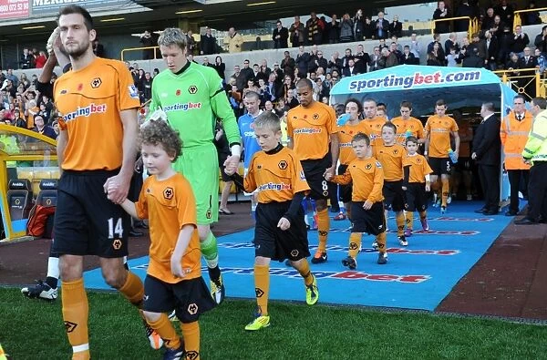 Mascot Clash: Wolves vs Wigan Athletic in the Barclays Premier League