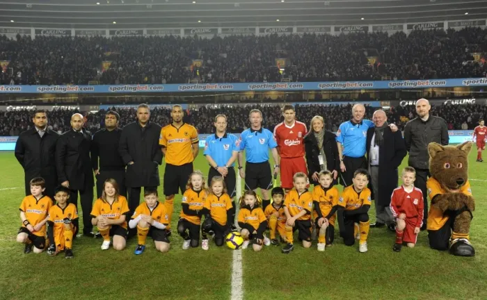 Framed Print : Mascot Showdown: Wolverhampton Wanderers vs Liverpool - A Thrilling Premier League Clash
