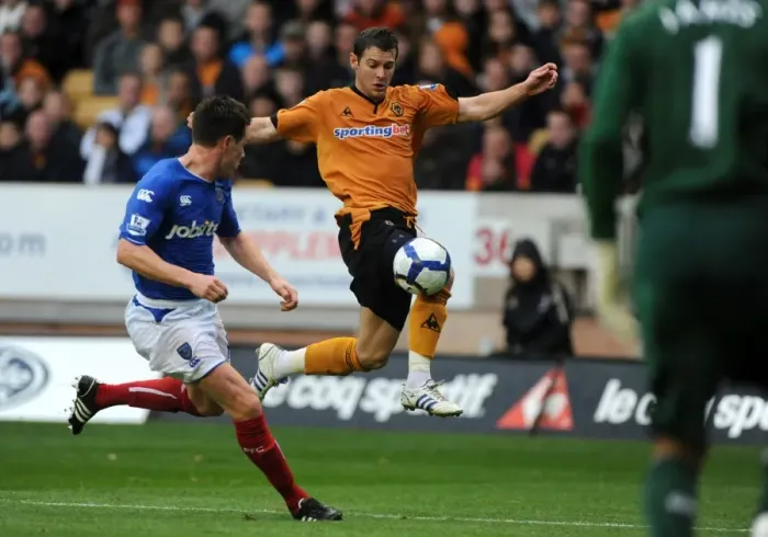 Framed Print : Matt Jarvis vs Steve Finnan: Intense Battle in Wolverhampton Wanderers vs Portsmouth Barclays Premier League Clash Framed Print : Matt Jarvis vs Steve Finnan: Intense Battle in Wolverhampton Wanderers vs Portsmouth Barclays Premier League Clash