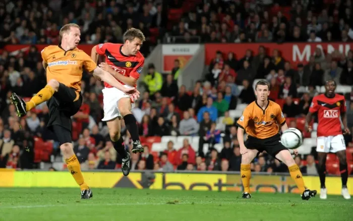 Framed Print : Michael Owen vs Jody Craddock: A Carling Cup Showdown - Manchester United vs Wolverhampton Wanderers: Clash of the Titans