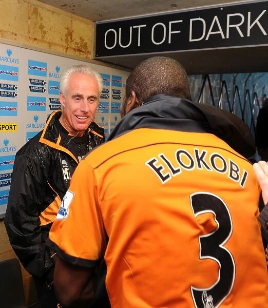 Mick McCarthy's Euphoric Victory: Wolverhampton Wanderers Manager Drenched in Water after Winning against Blackburn Rovers
