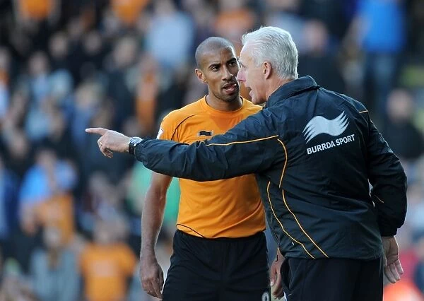 Mick McCarthy's Intense Moment with Karl Henry: Wolverhampton Wanderers vs Swansea in Barclays Premier League