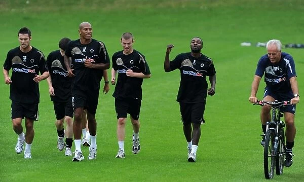 Mick McCarthy's Unique Beginning: Kicking Off Wolverhampton Wanderers' Premier League Pre-Season Training on a Bicycle (2009)