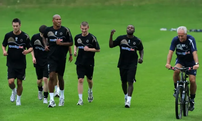 Framed Print : Mick McCarthy's Unique Beginning: Kicking Off Wolverhampton Wanderers Premier League Pre-Season Training on a Bicycle (2009)