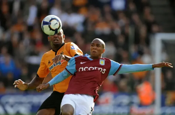Framed Print : Midlands Rivalry: Ashley Young vs. Ronald Zubar Clash in Premier League Soccer - Wolves vs. Aston Villa
