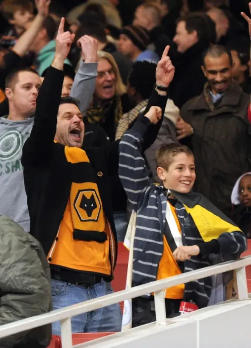 Framed Print : Passionate Clash: Arsenal vs. Wolverhampton Wanderers - Barclays Premier League Soccer Showdown: The Fans Battle Framed Print : Passionate Clash: Arsenal vs. Wolverhampton Wanderers - Barclays Premier League Soccer Showdown: The Fans Battle