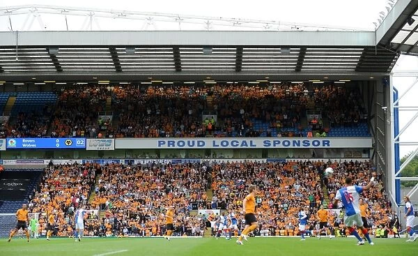 Passionate Wolverhampton Wanderers FC Fans on the Road: A Sea of Support at Blackburn vs. Wolves, Barclays Premier League