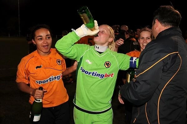 Players from Wolves Women celebrate after becoming Champions of the Midland Womens Combination League