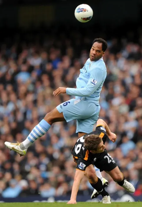 Framed Print : Premier League Showdown: Lescott vs. Doyle - Manchester City vs. Wolverhampton Wanderers Framed Print : Premier League Showdown: Lescott vs. Doyle - Manchester City vs. Wolverhampton Wanderers