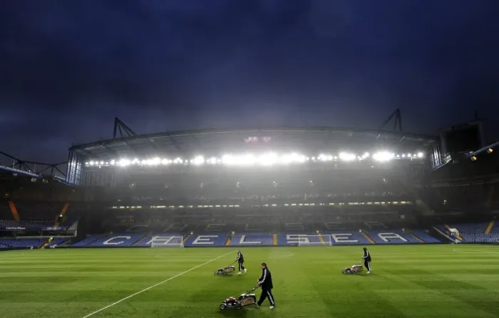 Framed Print : Preparing the Turf: Groundskeepers Ready Stamford Bridge for Wolves Premier League Battle Framed Print : Preparing the Turf: Groundskeepers Ready Stamford Bridge for Wolves Premier League Battle