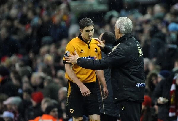 Red Card and Consolation: Mick McCarthy Comforts Stephen Ward of Wolverhampton Wanderers