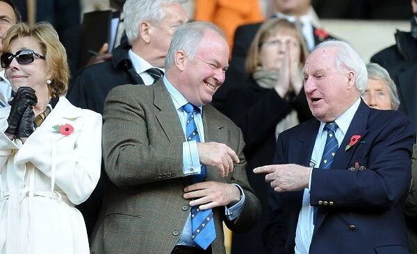 Sir Jack Hayward and Jonathan Hayward: A Father-Son Moment of Laughter at Wolves vs. Wigan Athletic in the Premier League