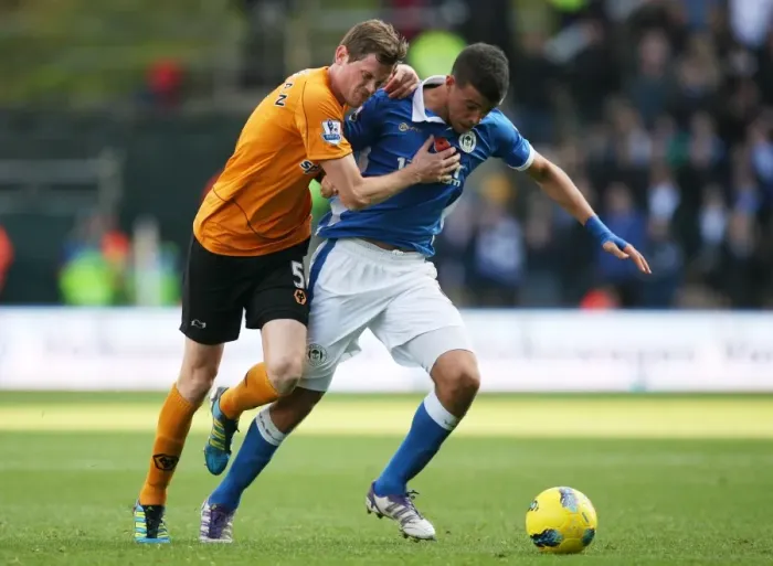 Framed Print : Stearman vs Di Santo: A Premier League Showdown at Wolverhampton Wanderers - Intense Battle Between Richard Stearman and Franco Di Santo