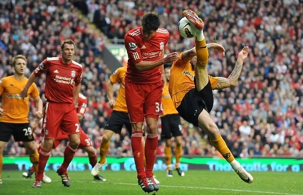 Steven Fletcher's Determined Shot at Goal for Wolverhampton Wanderers Against Liverpool (Barclays Premier League)