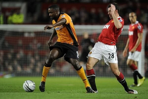 Sylvan Ebanks-Blake vs Darron Gibson: A Clash in the Carling Cup: Manchester United vs Wolverhampton Wanderers