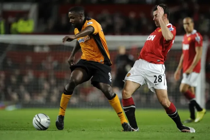 Framed Print : Sylvan Ebanks-Blake vs Darron Gibson: A Clash in the Carling Cup: Manchester United vs Wolverhampton Wanderers