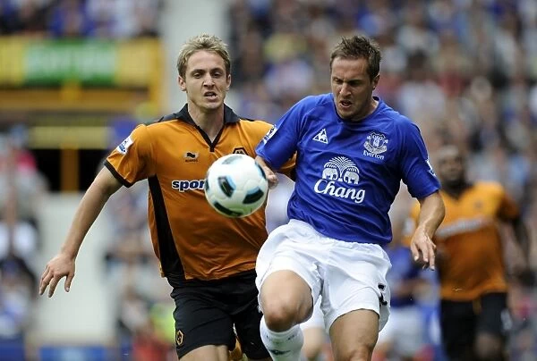 Tactical Showdown: Kevin Doyle vs. Philip Jagielka - Everton vs. Wolverhampton Wanderers, Barclays League Soccer Match