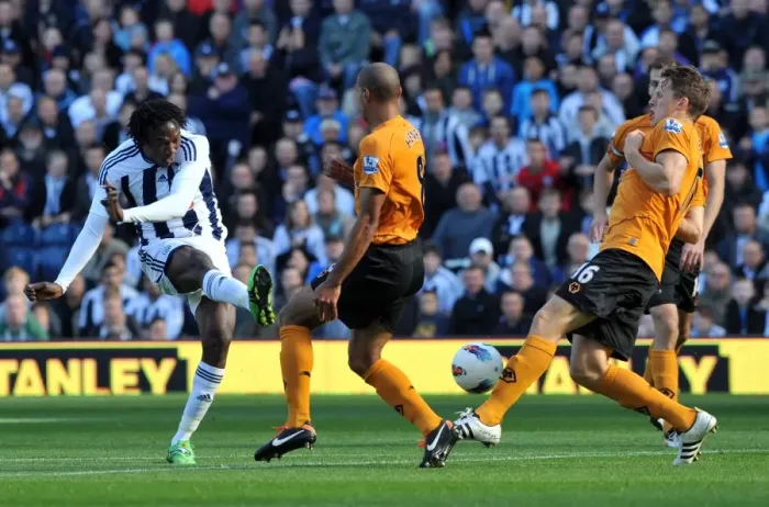 Framed Print : Tense Showdown: Tchoyi's Shot Thwarted by Henry and Berra (WBA vs. Wolverhampton Wanderers) Framed Print : Tense Showdown: Tchoyi's Shot Thwarted by Henry and Berra (WBA vs. Wolverhampton Wanderers)