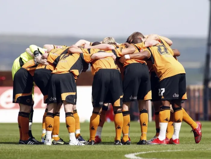 Framed Print : United in Determination: Wolverhampton Wanderers Before Barnsley Showdown, Championship 2009