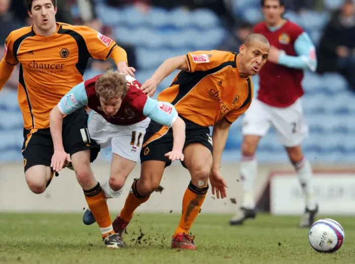 Framed Print : Wade Elliott vs Nigel Quashie: Intense Battle in Burnley vs Wolves Championship Clash at Turf Moor (2009) Framed Print : Wade Elliott vs Nigel Quashie: Intense Battle in Burnley vs Wolves Championship Clash at Turf Moor (2009)