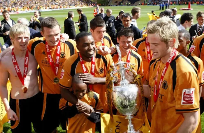 Framed Print : Wolverhampton Wanderers: 2008-09 Championship Title Win - Sylvan Ebanks Blake and Richard Stearman Celebrate Promotion with the Championship Trophy