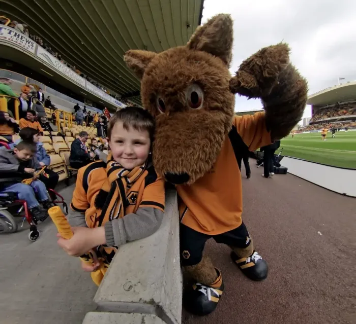Framed Print : Wolverhampton Wanderers: 2008-09 Championship Win - Triumphant Fan and Mascot with the Trophy Framed Print : Wolverhampton Wanderers: 2008-09 Championship Win - Triumphant Fan and Mascot with the Trophy