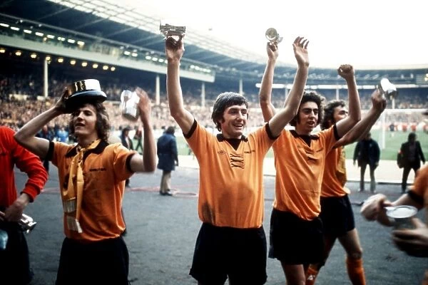 Wolverhampton Wanderers Celebrate League Cup Victory: Powell, Richards, Palmer Hold the Trophy