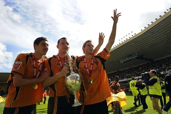 Wolverhampton Wanderers: Championship Promotion Triumph - Celebrating with the Trophy