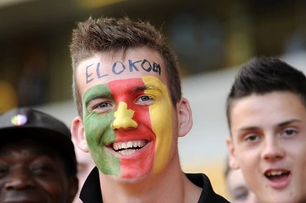 Wolverhampton Wanderers Fan Honors George Elokobi with Flag at Wolves vs. Blackburn Rovers, Premier League